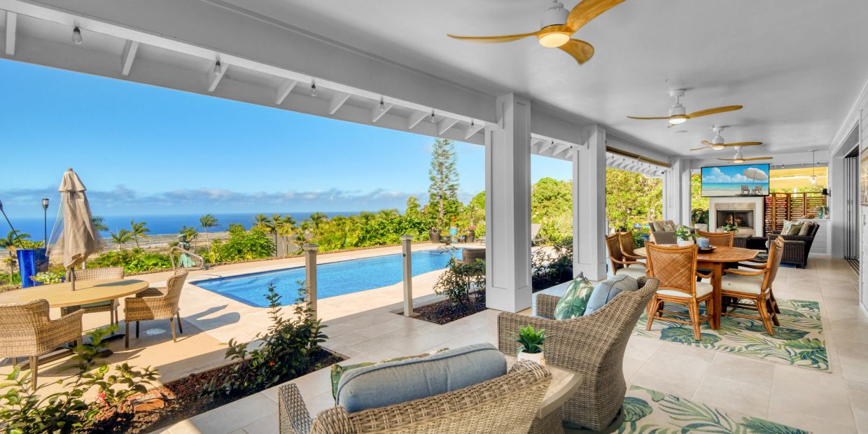 Covered lanai with pool and ocean views