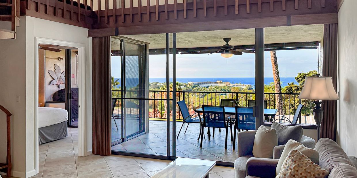 Living room of condo with ocean view in Kona