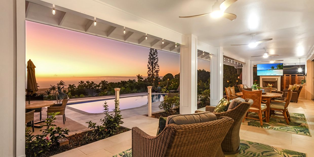 Covered lanai view of pool and ocean