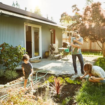 Happy family with solar panels