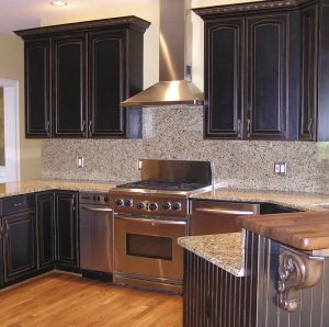 distressed black over brown cabinets
