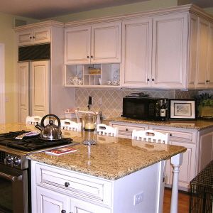 deep chocolate glaze over white cabinets