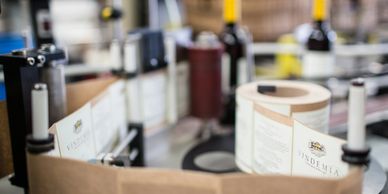Close-up of a label printing machine in a factory.