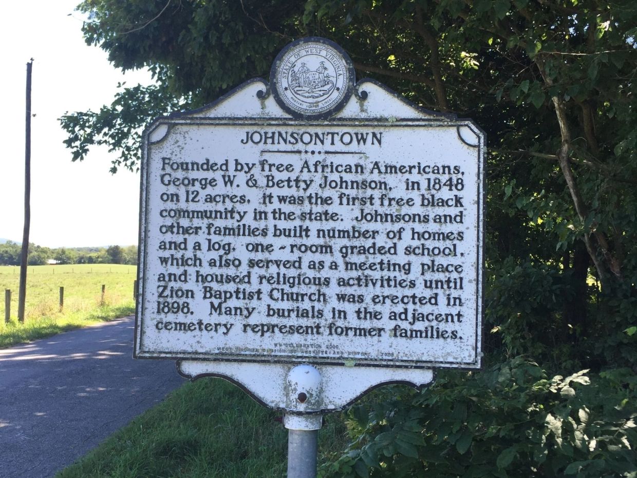 Historical sign about Johnsontown's founding by African Americans in West Virginia.