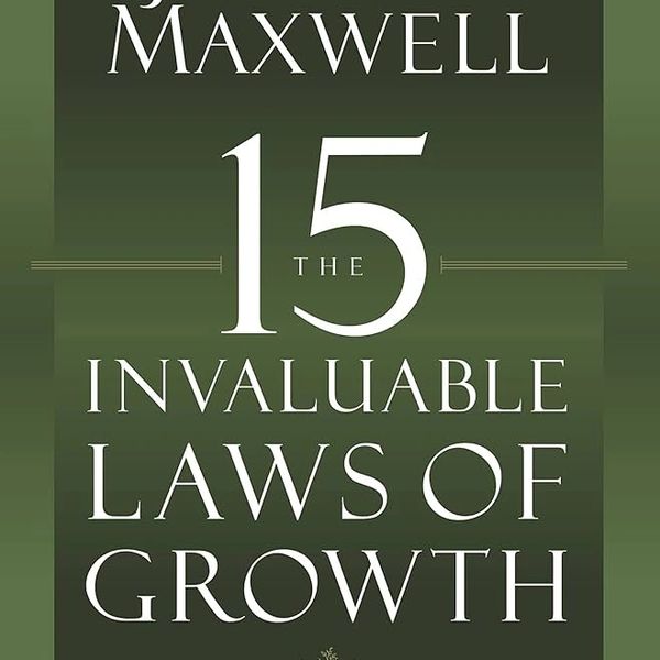Book cover titled 'The 15 Invaluable Laws of Growth' by Maxwell.