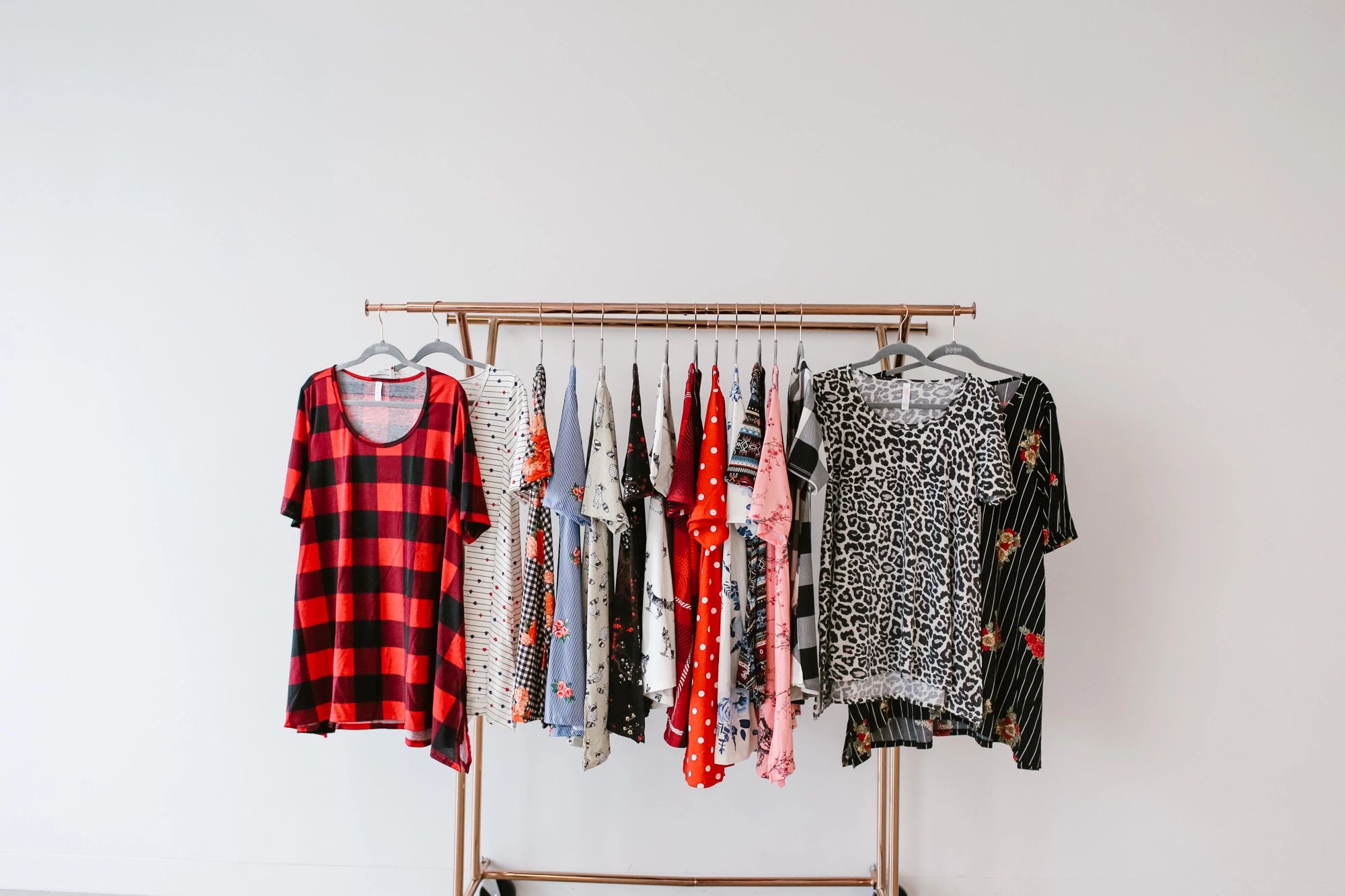 Lularoe perfect tees hanging on a clothes rack
