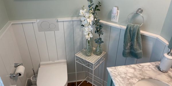 Bathroom refresh with custom beadboard, fresh paint, and vanity upgrades by LG Painting + Constructi