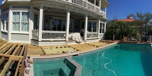 Custom poolside deck construction in progress. Built for beauty, durability, and outdoor living.