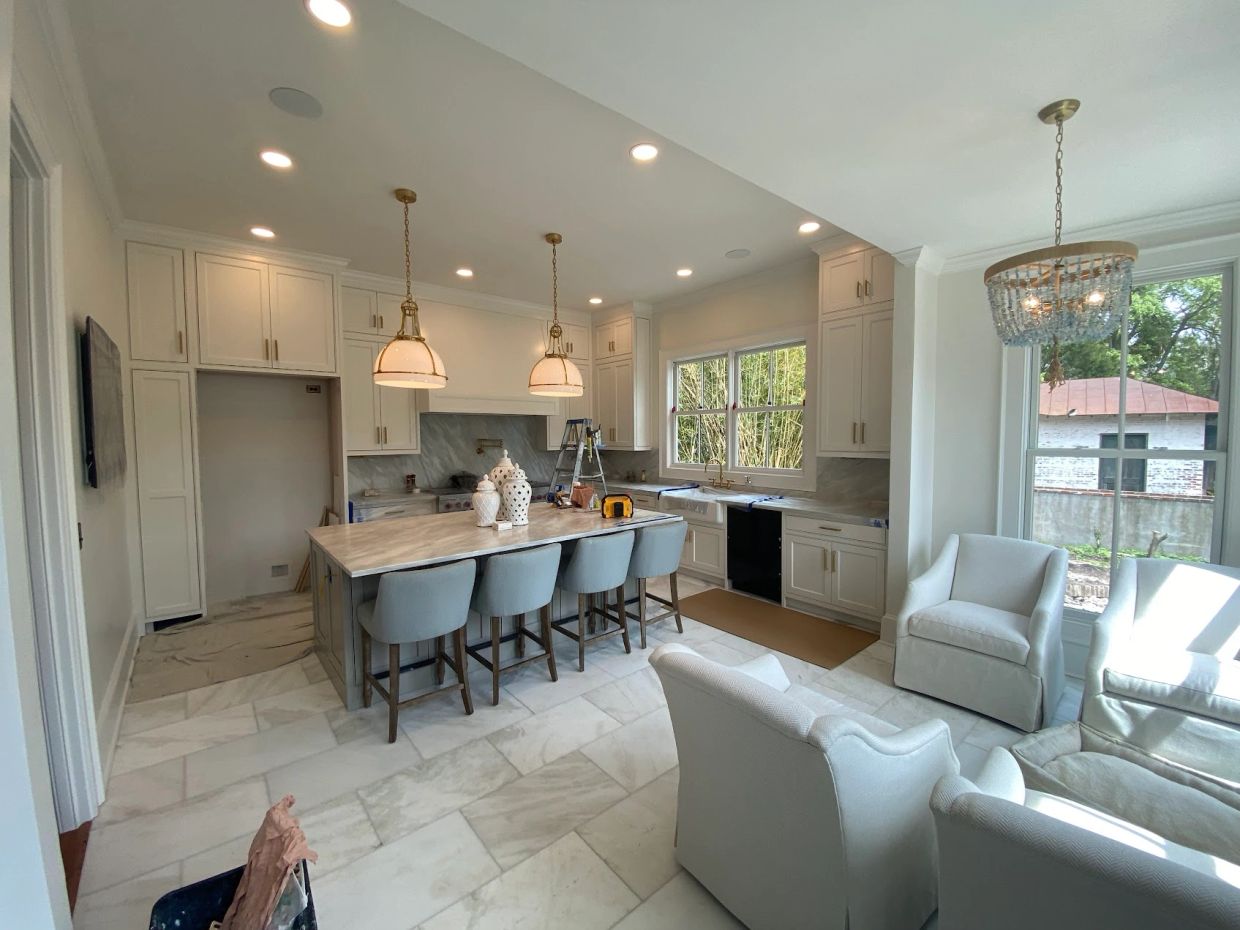 Modern kitchen with island and seating.