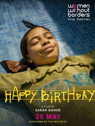 A woman lying peacefully with eyes closed, celebrating a film screening.