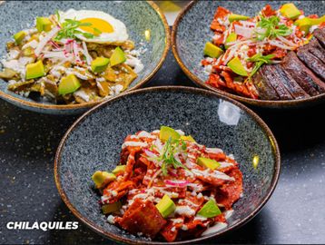 CHILAQUILES
Tortilla chips covered in your choice of signature salsa, cheese, cream and avocados