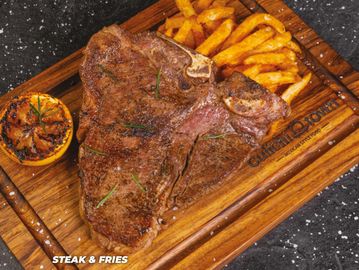 T-Bone 14 oz. caseras con parmesano y perejil.