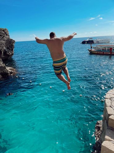 Cliff jumping at Rick's Cafe in Jamaica