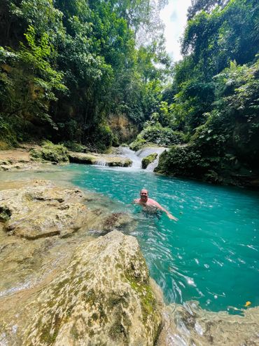 Cliff jumping at Blue Hole in Jamaica