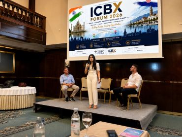 Speakers at the ICBX Forum 2026 in a formal setting.