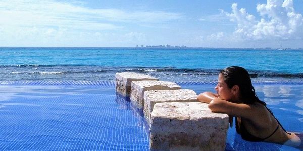 Book Royal Swim and Garrafon VIP Beach Club Experience Isla Mujeres