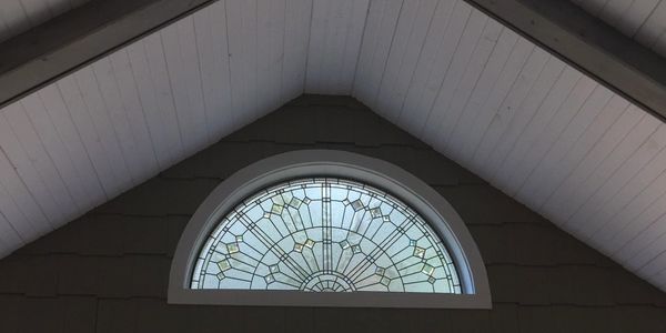 Screen porch ceiling and arched window detail