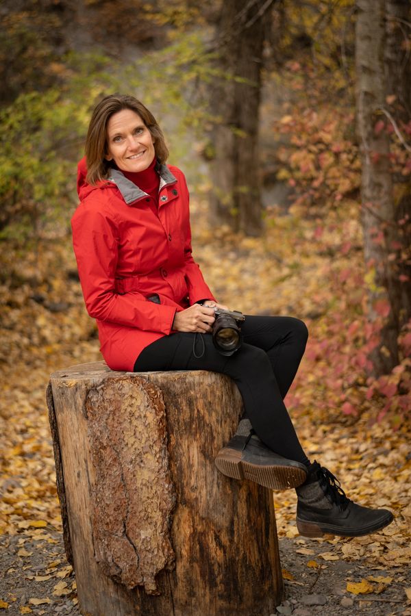 red jacket portrait of artist Kelly Sedgwick photographer in Missoula Montana
