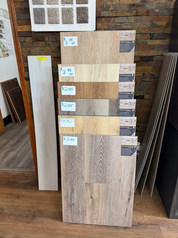 Wood floor samples with pricing displayed.