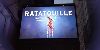 The theater marquee showing the logo of "Ratatouille: The TikTok Musical."