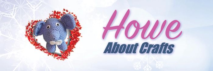 Cute crocheted blue elephant with 'Howe About Crafts' text on a winter background.