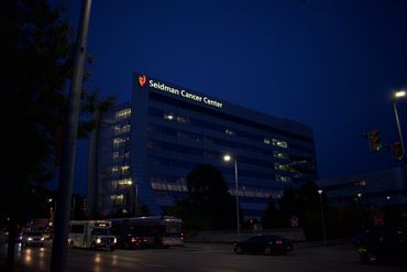 Image of the cancer center at night.