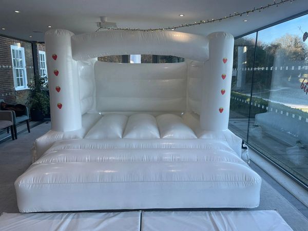 Personalised, white bouncy castle at Knebworth Golf Club, Hertfordshire
