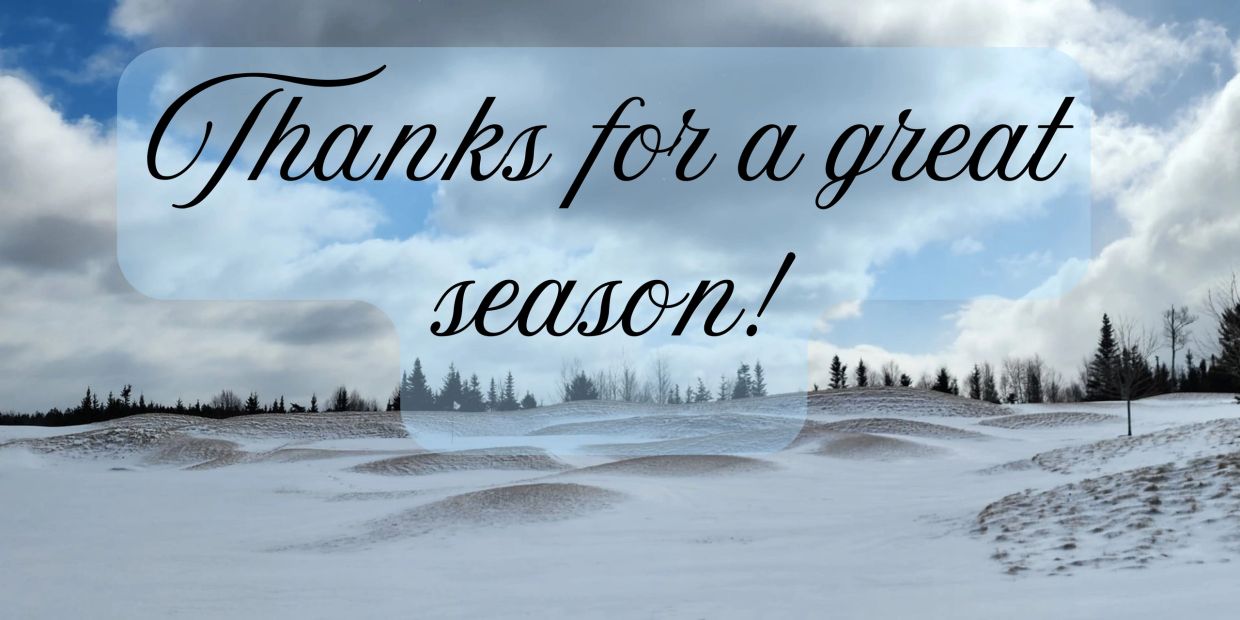 Snow-covered golf course with a thank you message for the season.