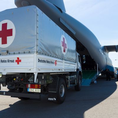 Humanitarian aid cargo being delivered to an aircraft