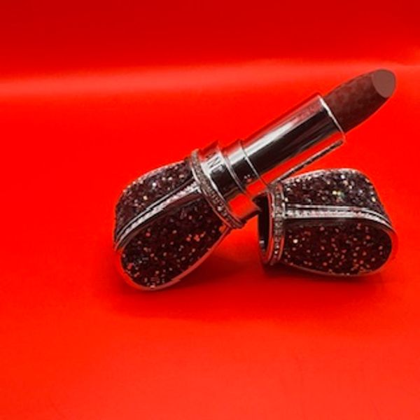 "Mack & Andy Duchess Comes wrapped in a sleek chocolate rhinestone bowtie--think deep mocha."