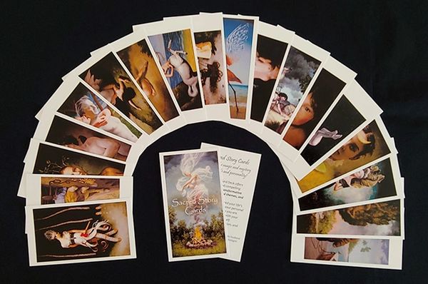A bunch of cards kept on a black table.