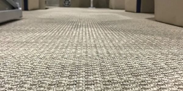 Close-up of durable laminate flooring textures in a modern home.