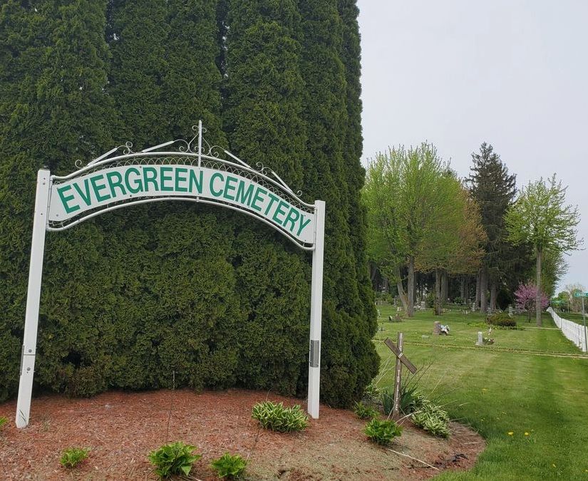 A photo of the Evergreen Cemetery Sign