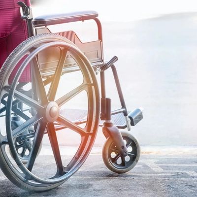 Close-up of a wheelchair wheel.