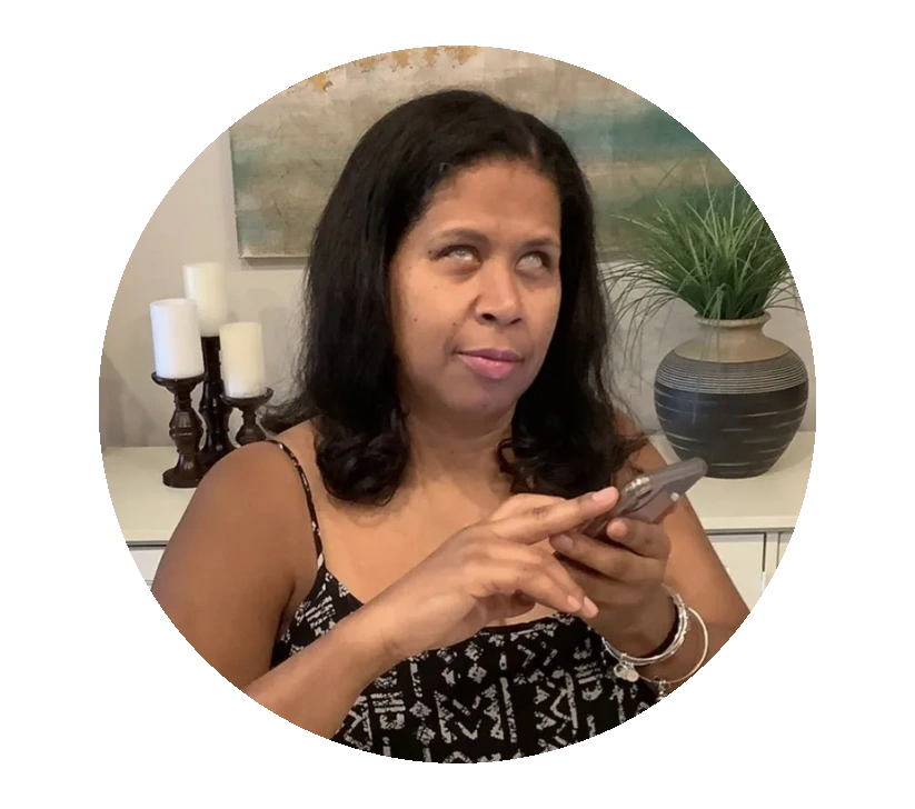 Stephanie Adams, Certified Lymphedema Therapist, attentively listens to a SWFL patient on her phone.