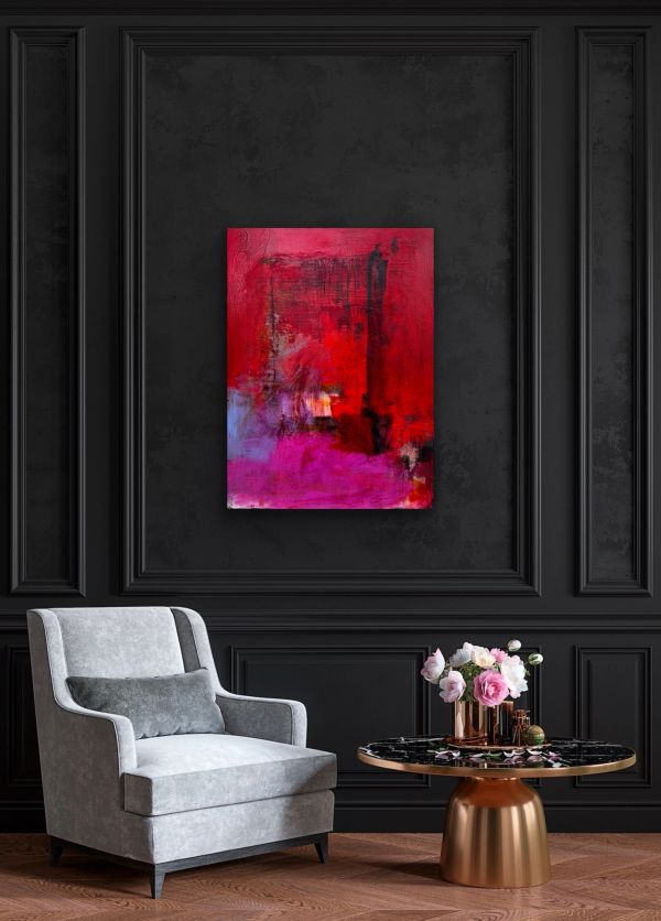 Modern living room with gray chair and red-purple abstract painting.