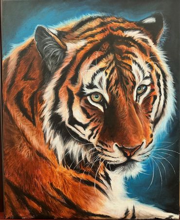 Orange bengal tiger painting with a blue glowing background