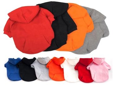 A stack of custom-colored dog T-shirts.