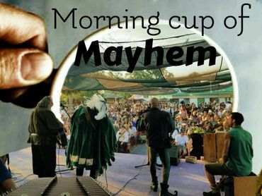 A lively crowd and band seen through a coffee cup with the phrase 'Morning cup of Mayhem'.