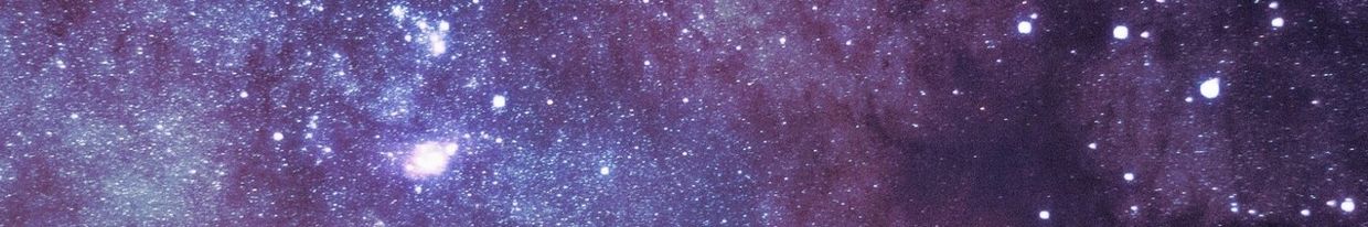 View of a starry night sky with galaxy clusters.