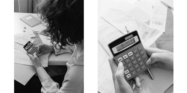 A woman holding and typing on a calculator.