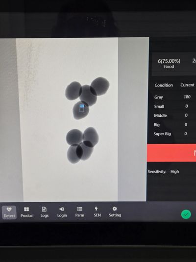 X ray food inspection showing metal with overlaped product.