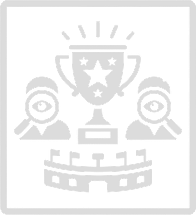 Two individuals celebrating a trophy with a castle below.