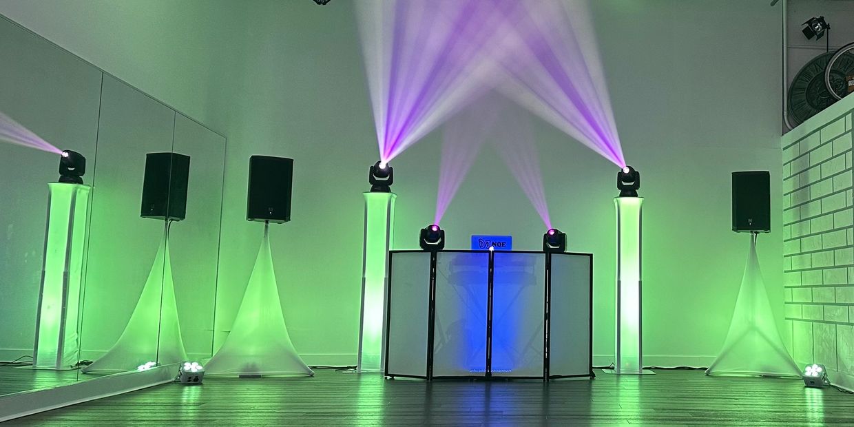 4 moving head lights chauvet prurple and green DJ setup for rent in miami 