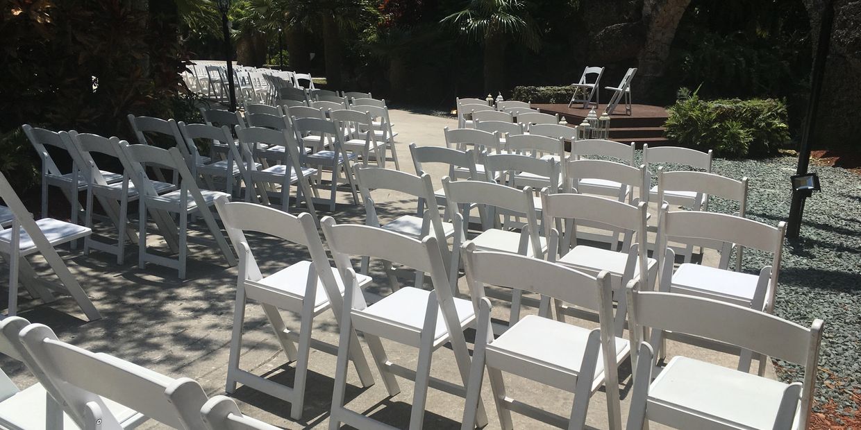 White Wedding Padded chairs at a ceremony wedding
