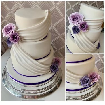Three Tier wedding cake with sugar paste drape and handmade sugar flowers.