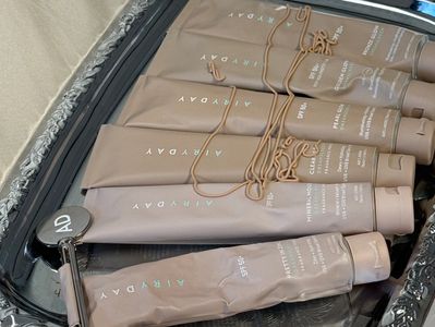 Multiple tubes of a skincare product arranged neatly.