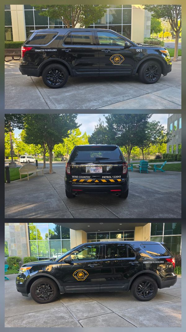 Black police SUV with 'Wine Country Patrol' markings parked outdoors.