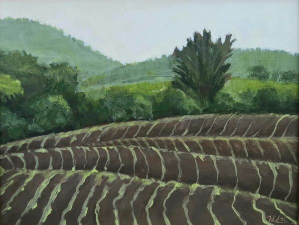 Painting of a plowed field with trees and hills in the background.