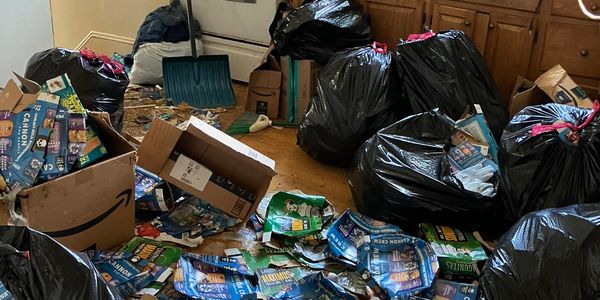 junk removal in pawtucket ri lots of household garbage bags on the floor and empty boxes